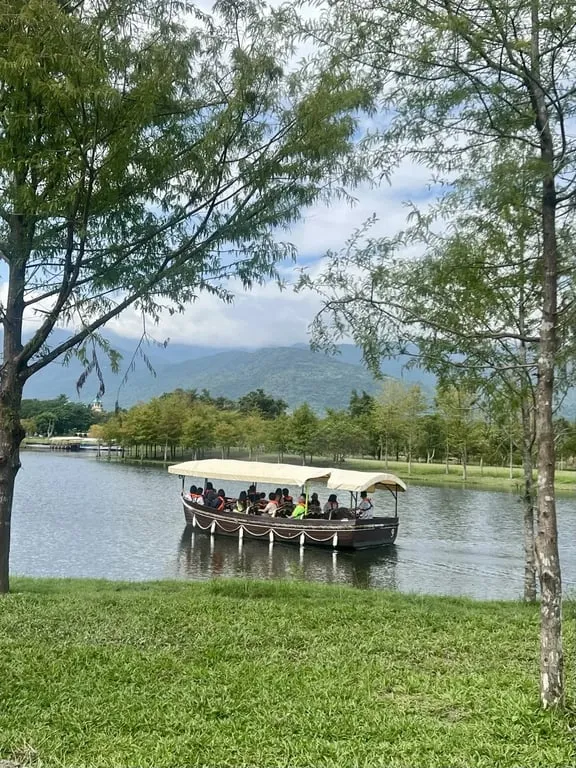 Electric canal boat along Promised Canal Promisedland Resort — Taiwan Insider